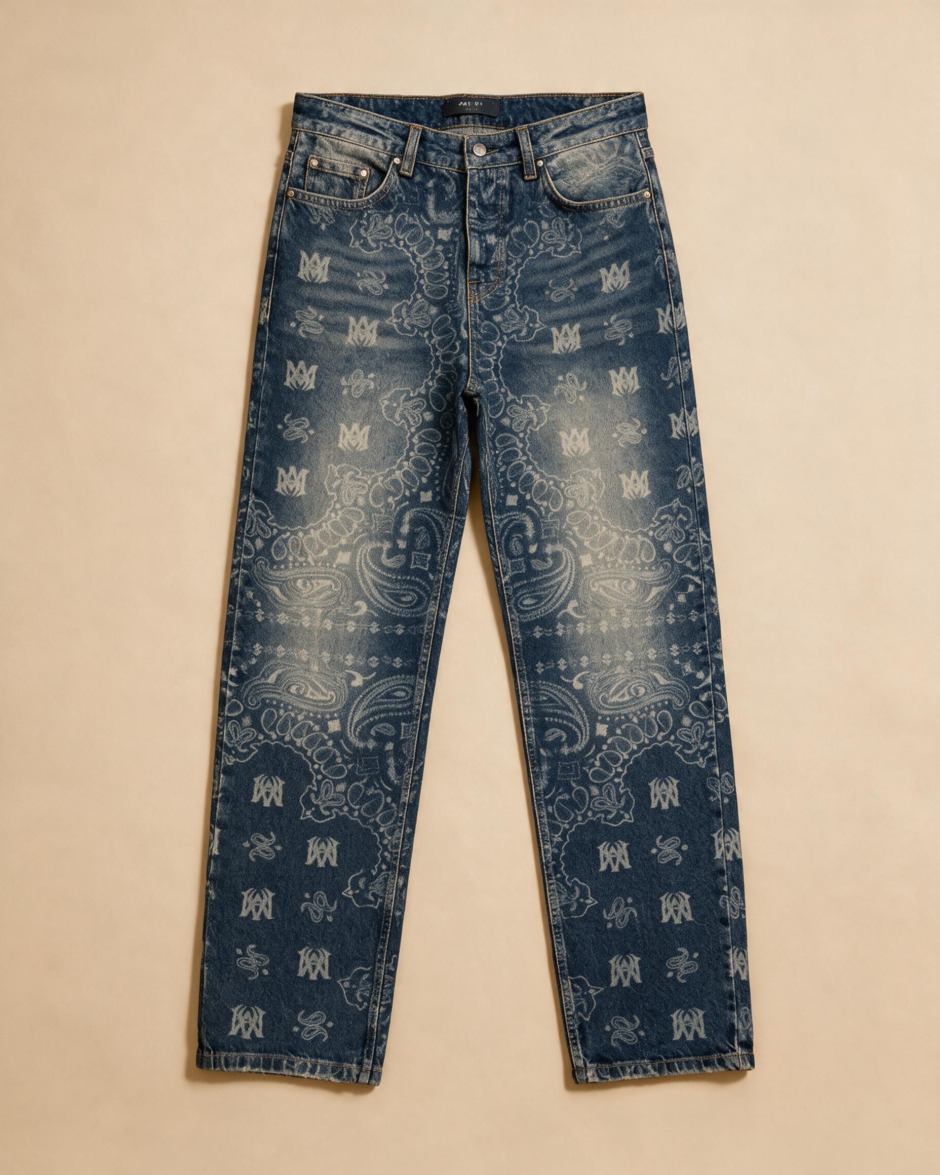 Jeans usati con stampa paisley e monogramma